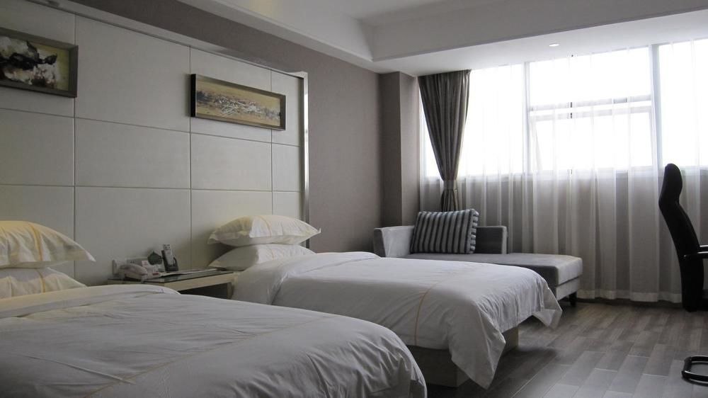Sheng Jing Yi Jia Hotel Hucsi Kültér fotó